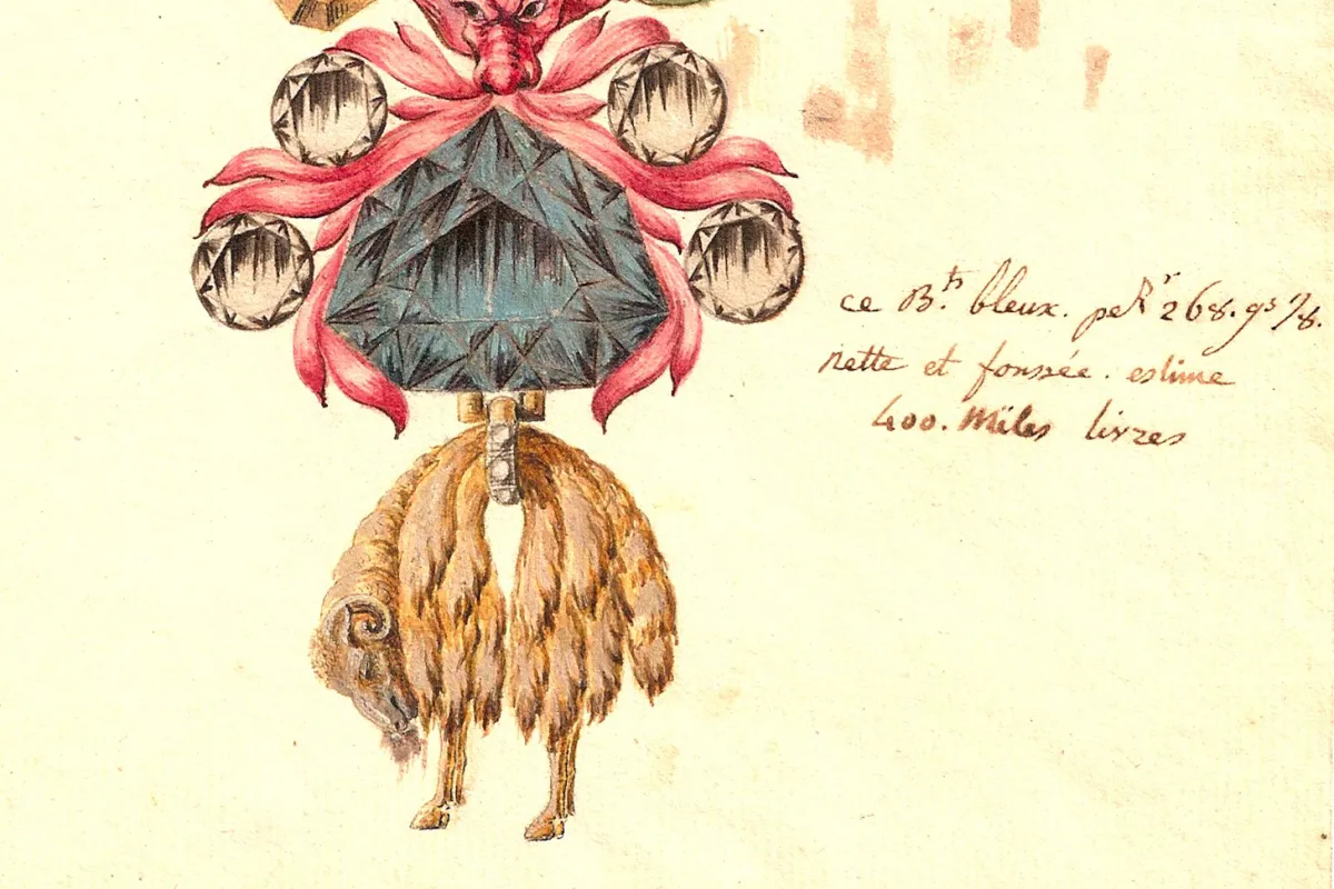 Fleece dangles from jewelry featuring a large blue diamond