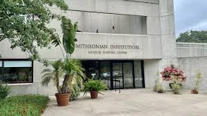 Main entrance to the Museum Support Center showing front doors and concrete building front. 